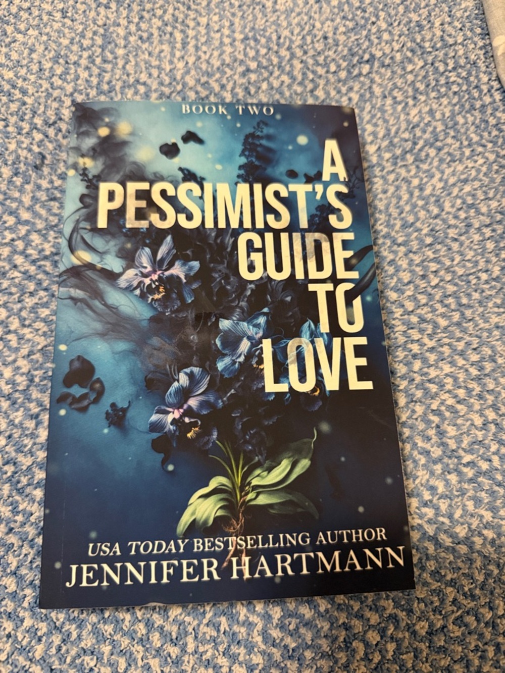 A Pessimist's Guide to Love by Jennifer Hartmann - Blue Floral Cover